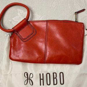 HOBO Sable wristlet in “Rio” with dust bag